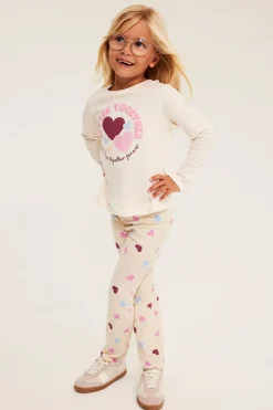 Legginsy dzwony z wzorem w serca