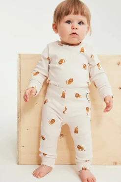 Legginsy we wzór w lwy