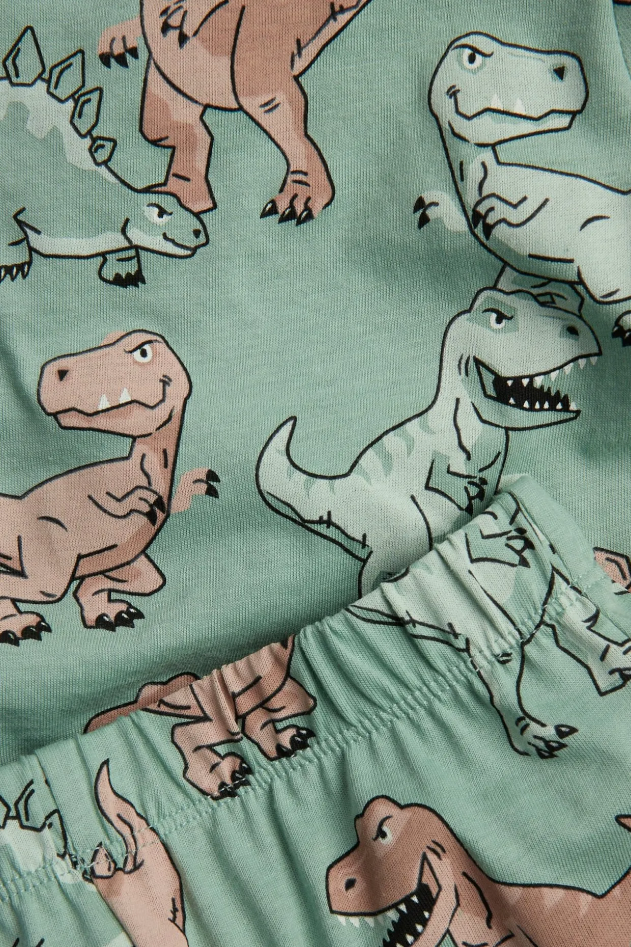 Piżama bawełniana w dinozaury.