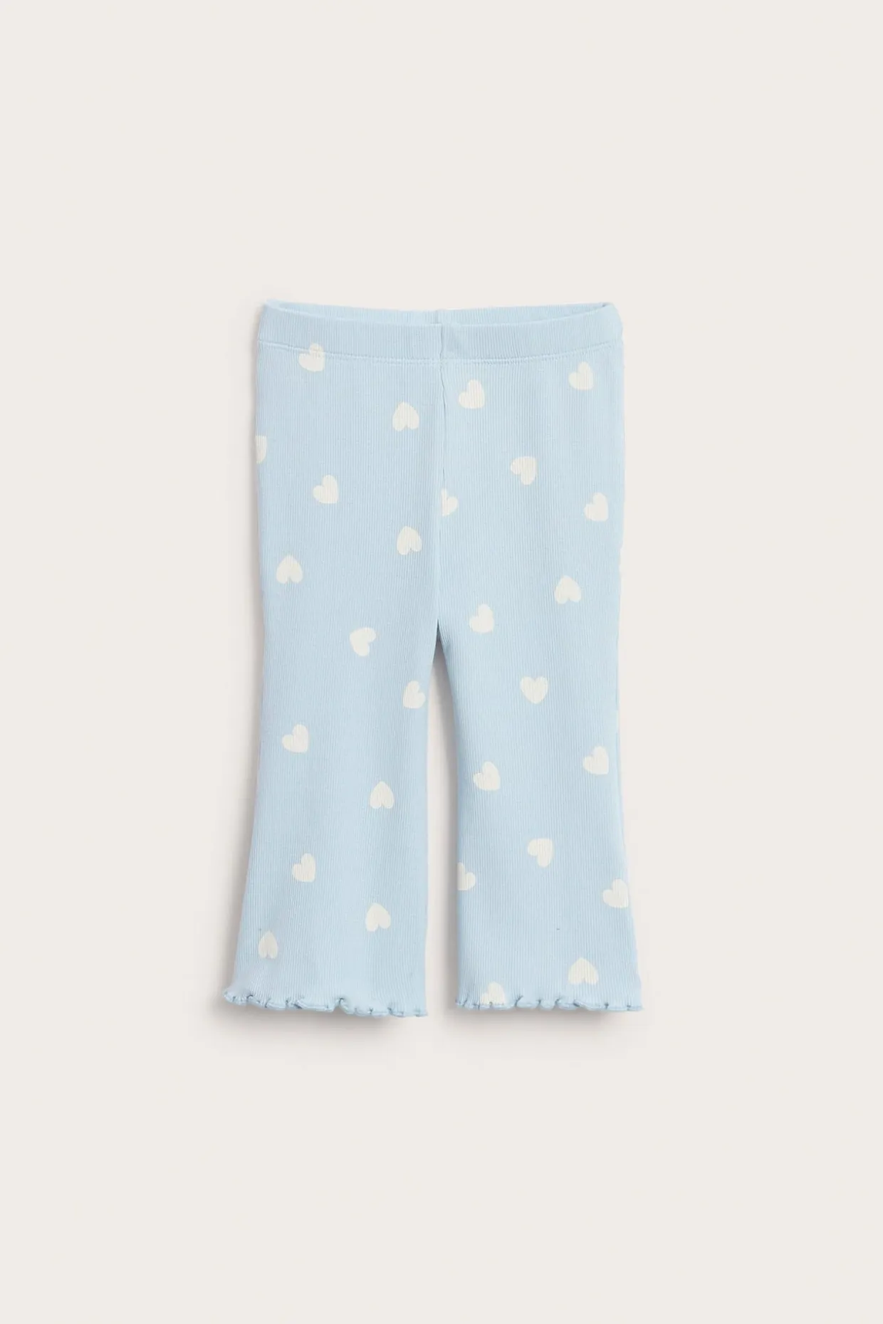 Rozkloszowane legginsy w serduszka