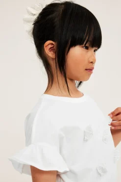 Top z falbaną i aplikacją
